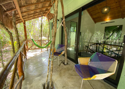 Villa Jaguar, accommodation in Cozumel, exterior, nature, balcony, rustic, chairs, trees, Cozumel